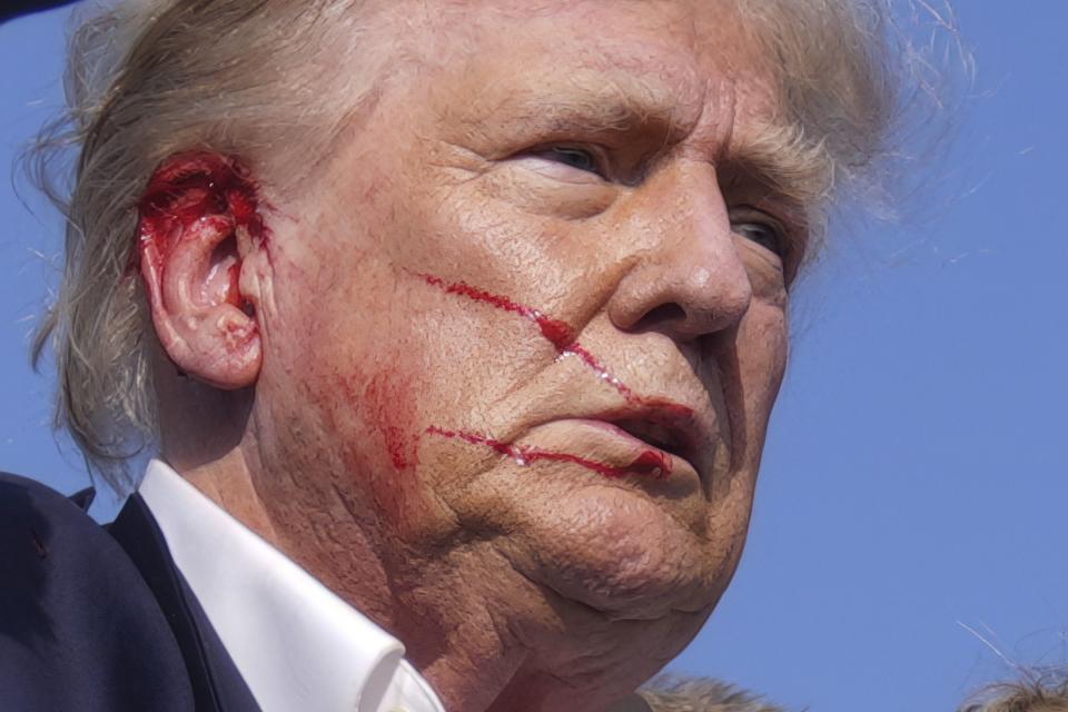 Republican presidential candidate former President Donald Trump is moved from the stage at a campaign rally, Saturday, July 13, 2024, in Butler, Pa. (AP Photo/Evan Vucci)