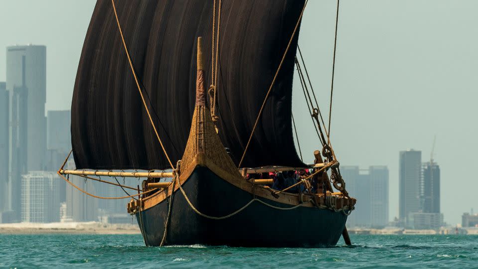 A crew of more than 20 was required to hoist the heavy goat hair sail and rigging since the ship has no pulley systems aboard and it was built only with technology available during the Bronze Age. - Emily Harris/Zayed National Museum