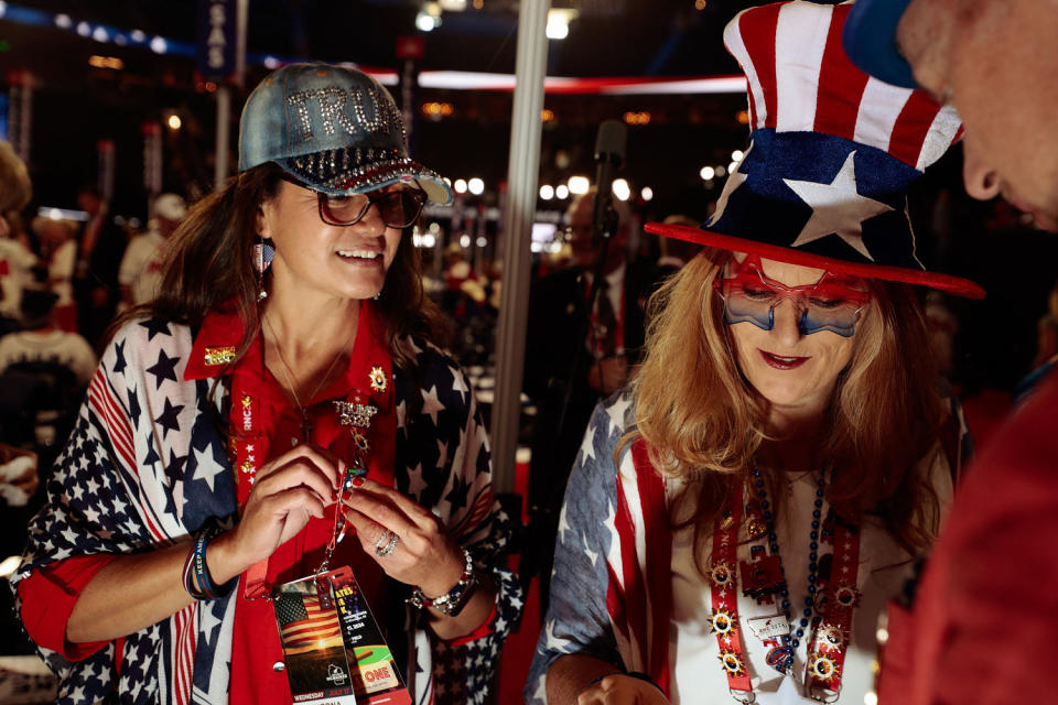 Trump gear and American flag-themed gear mixed on the convention floor.  (Mustafa Hussain for NBC News)