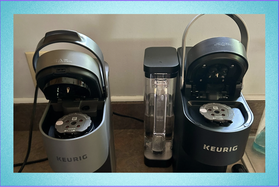 Two open Keurig machines 