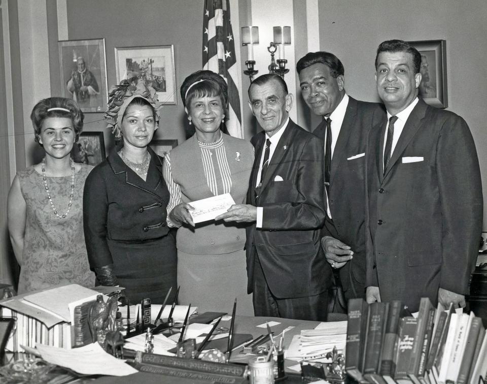 Jack Sensenbrenner, center, was reelected as Columbus mayor in 1963 and chose William H. Brooks, second from right, to be a member of his cabinet as the city's Department of Public Utilities director.