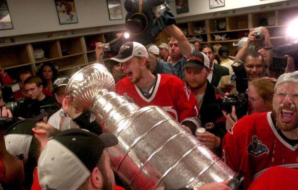 Eric Staal and the Canes party with the Stanley Cup in the locker room after the Carolina Hurricanes beat the Edmonton Oilers in Game 7 of the Stanley Cup at the RBC Center in 2006.