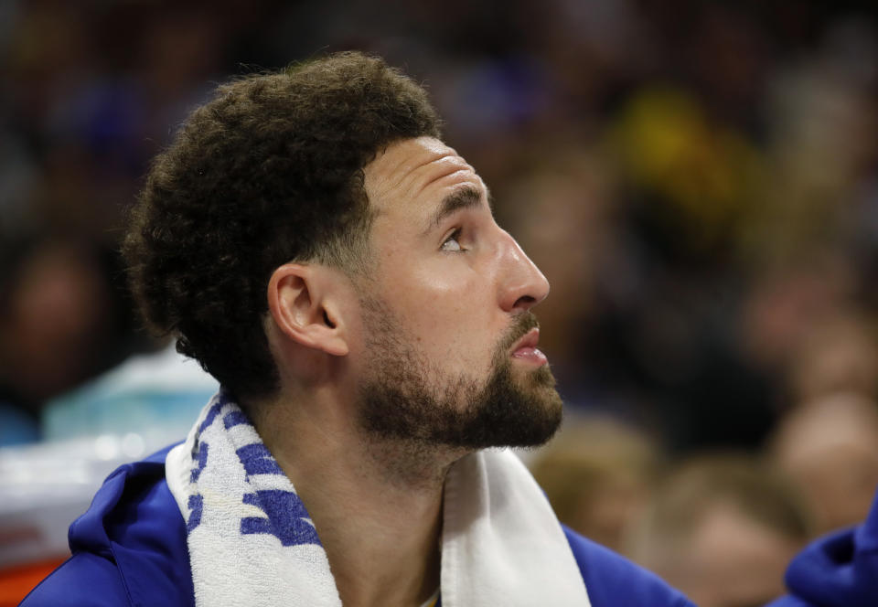 SACRAMENTO, CALIFORNIA - APRIL 16: Golden State Warriors' Klay Thompson #11 looks up at the score in the third quarter of their NBA play-in tournament game against the Sacramento Kings at the Golden One Center in Sacramento, Calif., on Tuesday, April 16, 2024. (Jane Tyska/Digital First Media/East Bay Times via Getty Images)