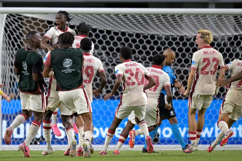 Copa América debutants Canada beat Venezuela on penalties to reach semis