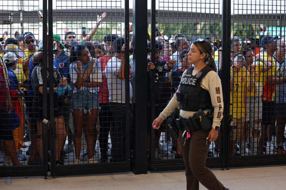 Supporters without tickets wait outside the stadium ahead of the Conmebol 2024 Copa America tournament final football match between Argentina and Colombia at the Hard Rock Stadium, in Miami, Florida on July 14, 2024. (Photo by CHARLY TRIBALLEAU / AFP) (Photo by CHARLY TRIBALLEAU/AFP via Getty Images)