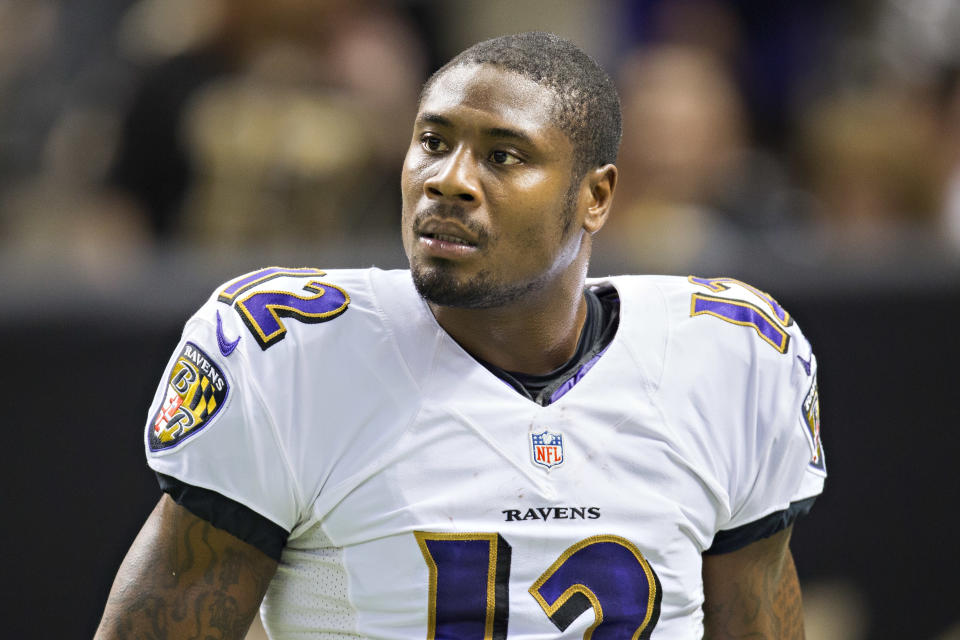 NEW ORLEANS, LA - NOVEMBER 24:  Jacoby Jones #12 of the Baltimore Ravens warms up before a game against the New Orleans Saints at Mercedes-Benz Superdome on November 24, 2014 in New Orleans, Louisiana.  The Ravens defeated the Saints 34-27.  (Photo by Wesley Hitt/Getty Images)