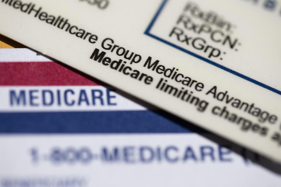 A UnitedHealthcare Group Medicare Advantage PPO card rests on top of a Medicare card is seen on Monday, June 10, 2024, in Portland, Ore. (AP Photo/Jenny Kane)