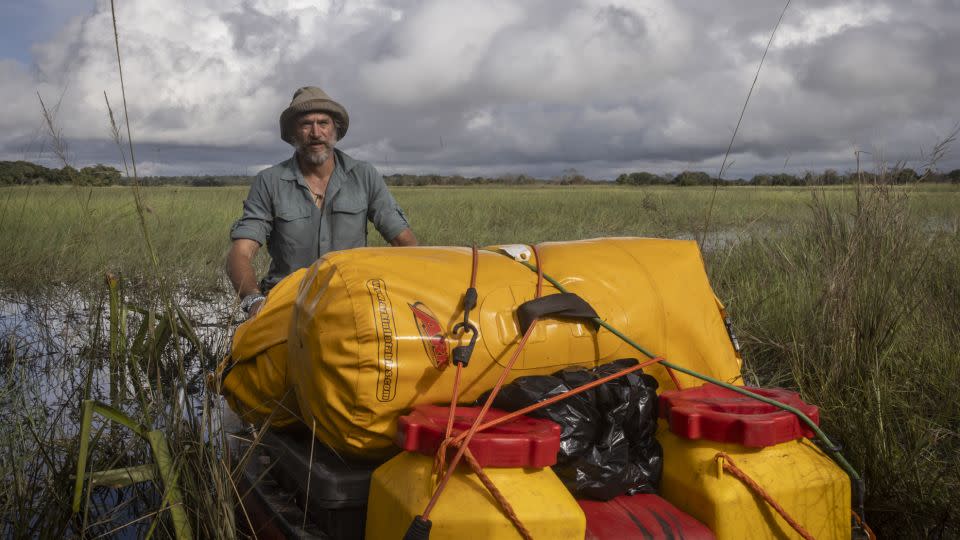 Steve Boyes on a Great Spine of Africa expedition. Canoes are filled with research equipment and supplies, often weighing over 350 kilograms. - James Kydd