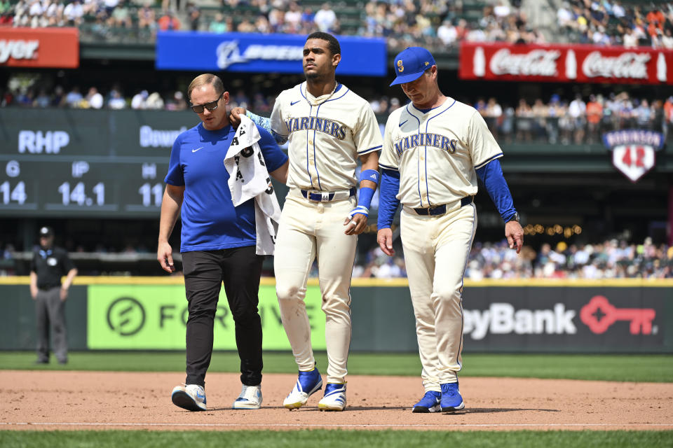 Julio Rodríguez's health status moving forward has significant implications for the AL West race. (Alika Jenner/Getty Images)