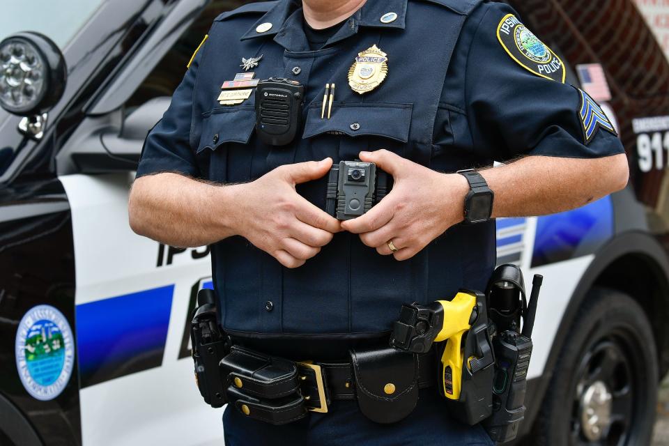 Ipswich Police Sgt. Eric Copithorne displays the body cameras worn by the department's officers. Departments in 32 communities in Massachusetts just received grant money for the cameras.