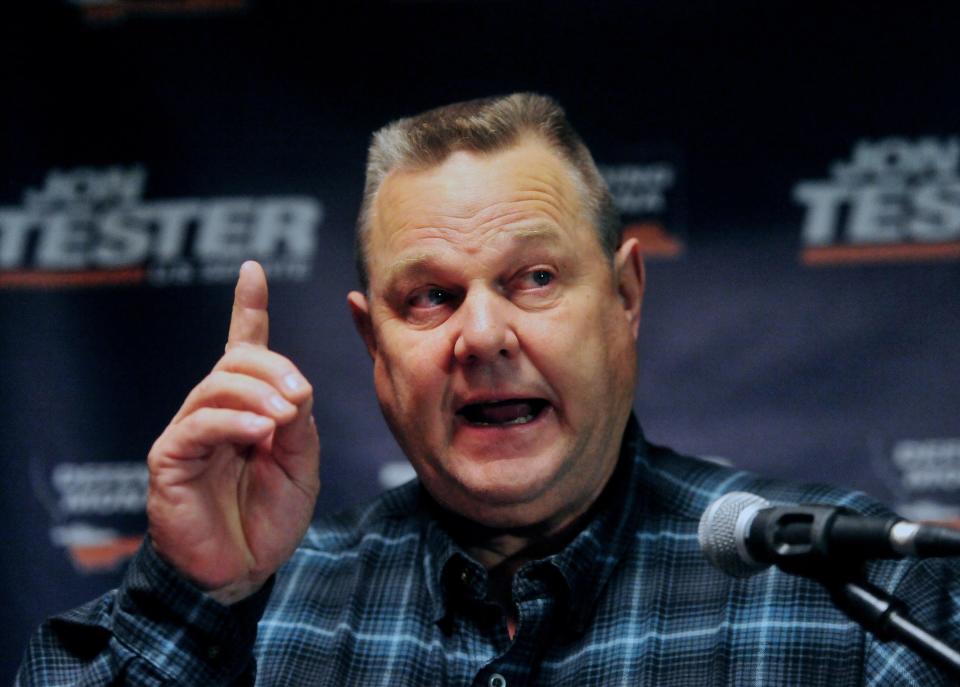 Sen. Jon Tester speaks at an election event in 2018 after he was re-elected to represent Montana in Congress. Tester, facing another election challenge to retain his Senate seat this fall, on Thursday called on President Joe Biden not to seek re-election.