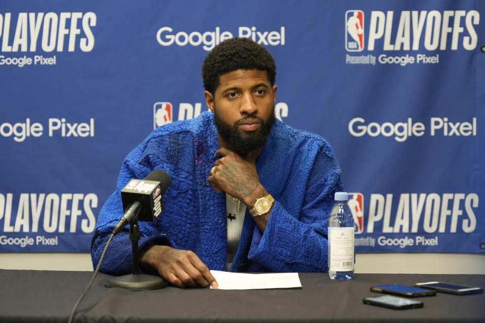 DALLAS, TX - MAY 3:  Paul George #13 of the LA Clippers is interviewed by the media after Round 1 Game 6 of the 2024 NBA Playoffs against the Dallas Mavericks on May 3, 2024 at the American Airlines Center in Dallas, Texas. NOTE TO USER: User expressly acknowledges and agrees that, by downloading and or using this photograph, User is consenting to the terms and conditions of the Getty Images License Agreement. Mandatory Copyright Notice: Copyright 2024 NBAE (Photo by Jim Cowsert/NBAE via Getty Images)