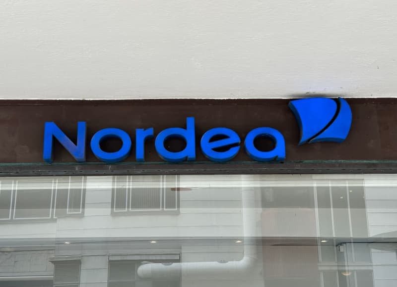 The Nordea logo can be seen at a branch in Copenhagen. Danish authorities on Friday accused the Finland-based Nordea bank with failing to take action to prevent more than $3.5 billion in money laundering by clients in Russia. Steffen Trumpf/dpa