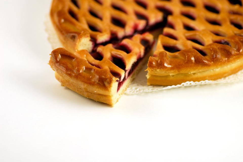 Close-up photo of a pie with one slice separated from the main crust.