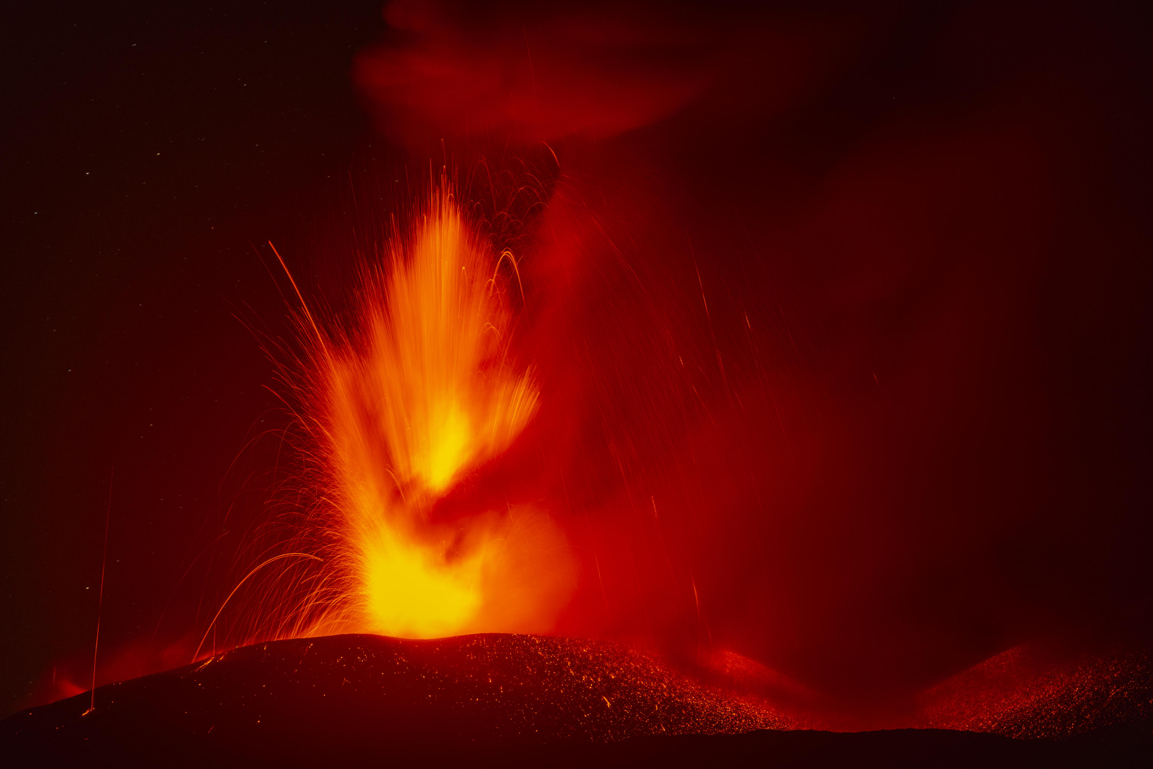 A view of Etna volcano during strong ash and lava spewing in Catania, Italy on July 5, 2024. (Salvatore Allegra/Anadolu via Getty Images)