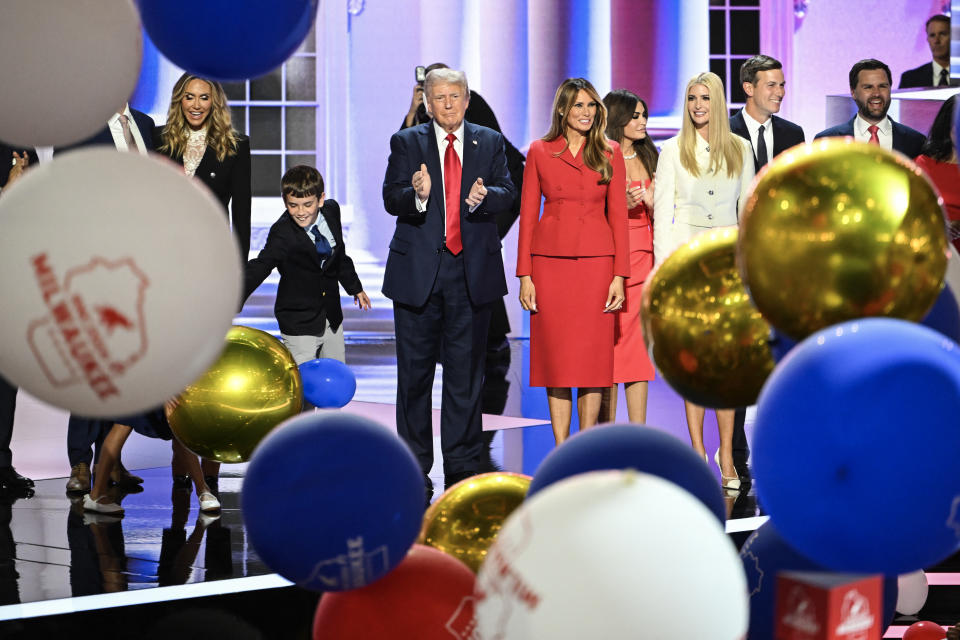 TOPSHOT - Former US President and 2024 Republican presidential candidate Donald Trump stands alonside former US First Lady Melania Trump and family after he accepted his party's nomination on the last day of the 2024 Republican National Convention at the Fiserv Forum in Milwaukee, Wisconsin, on July 18, 2024. Days after he survived an assassination attempt Trump won formal nomination as the Republican presidential candidate and picked Ohio US Senator J.D. Vance for running mate. (Photo by ANDREW CABALLERO-REYNOLDS / AFP) (Photo by ANDREW CABALLERO-REYNOLDS/AFP via Getty Images)