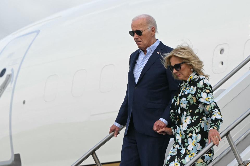 US President Joe Biden and First Lady Jill Biden step off Air Force One upon arrival at McGuire Air Force Base in New Jersey on June 29, 2024. Biden is in New Jersey for campaign fundraisers. (Photo by Mandel NGAN / AFP) (Photo by MANDEL NGAN/AFP via Getty Images)