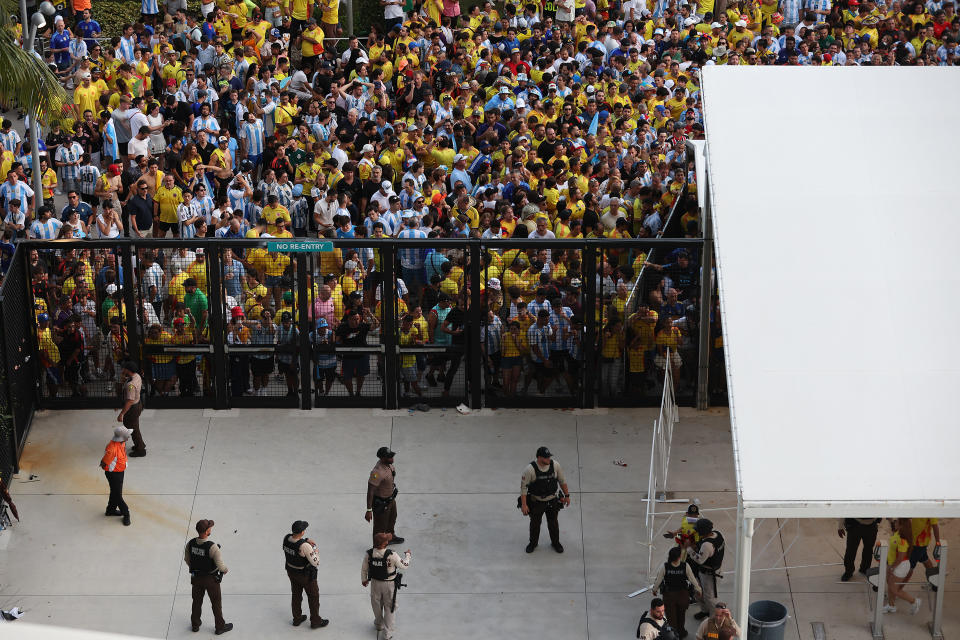 MIAMI GARDENS, FLORIDA - JULY 14: Large crowds of fans try to enter the stadium amid disturbances prior the CONMEBOL Copa America 2024 Final match between Argentina and Colombia at Hard Rock Stadium on July 14, 2024 in Miami Gardens, Florida. (Photo by Megan Briggs/Getty Images)