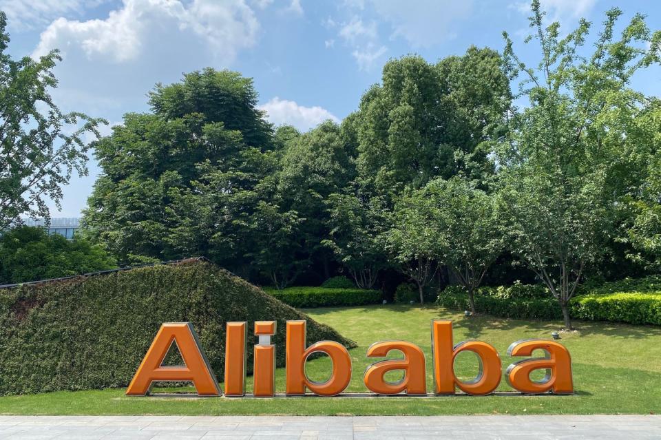 The Alibaba logo on a lawn.