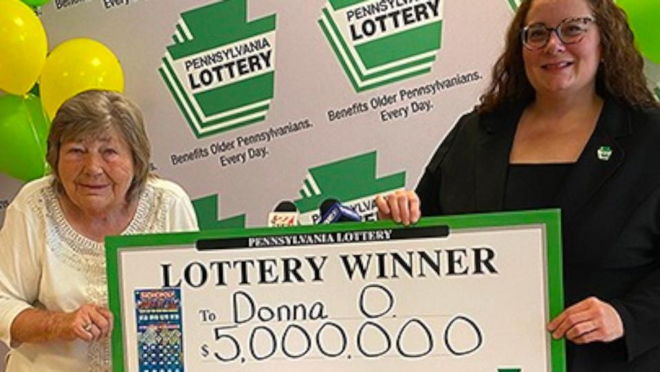 PHOTO: Lottery winner Donna Osborne, left, poses with Staci Coombs, deputy director of corporate sales for the Pennsylvania Lottery. (Pennsylvania Lottery)