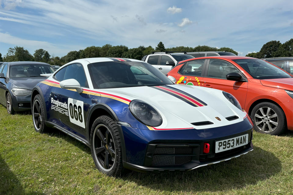 <p><span><span>First up is this awesome 992 Dakar, one of 2500, finished in a 959-aping Rothmans imitation livery.</span></span></p><p><span><span>While we’re normally sceptical about racing liveries on road cars, it works well here because the Dakar does such a convincing job of looking like a </span><span>Paris-Dakar machine</span><span> – it’s got proper ground clearance, four-wheel drive, tow hooks and offroad-ready tyres.</span></span></p>