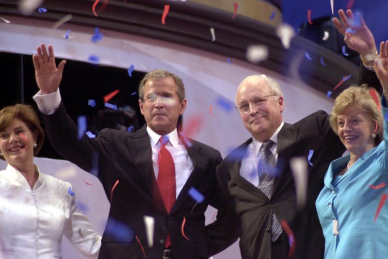 George W. Bush, his wife Laura Bush, Richard Cheney and his wife Lynne Cheney acknowledge cheers from the delegates at the conclusion of the Republican National Convention in Philadelphia on August 3, 2000. File Photo by Ezio Petersen/UPI