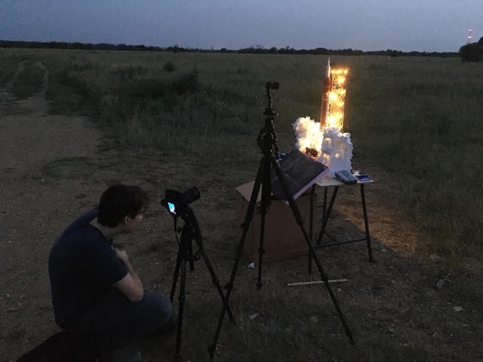 Behind-the-scenes shots of Lampert creating his Lego Artemis project