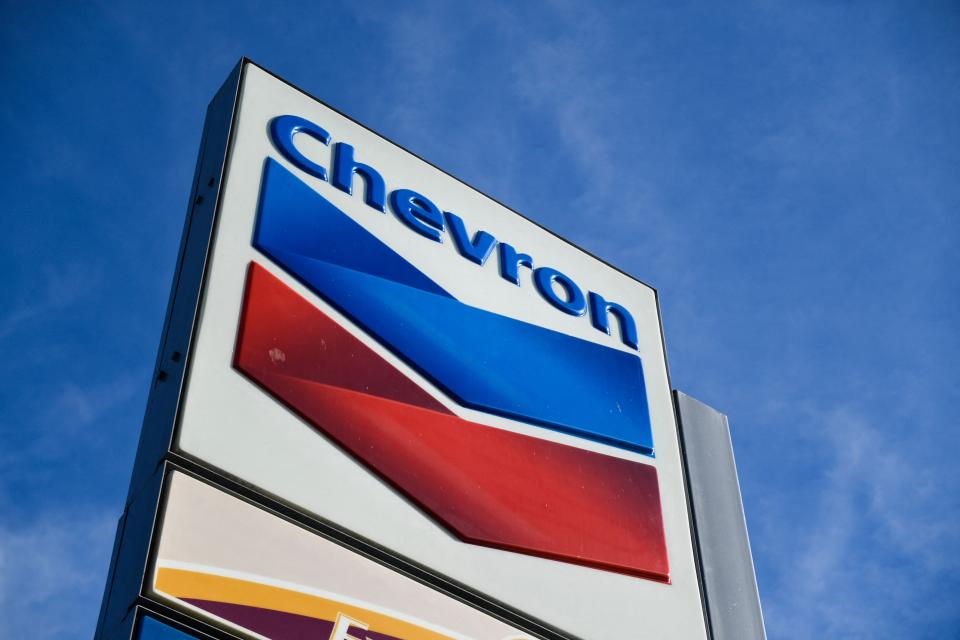 The Chevron logo is displayed at a Chevron gas station.