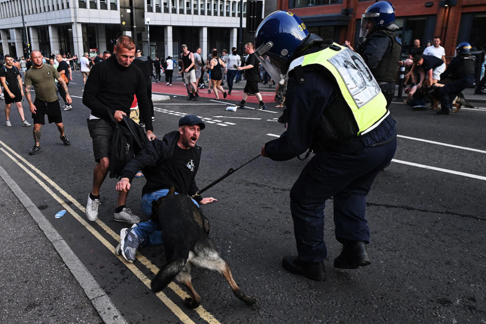 UK police prepared for planned far-right protests and other demonstrations this weekend, after two nights of unrest in several English towns and cities following a mass stabbing that killed three young girls. (Justin Tallis / AFP - Getty Images)