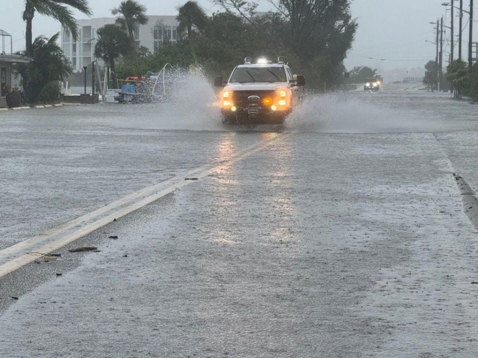 Manasota Key Road near Blind Pass Beach is underwater and closed.