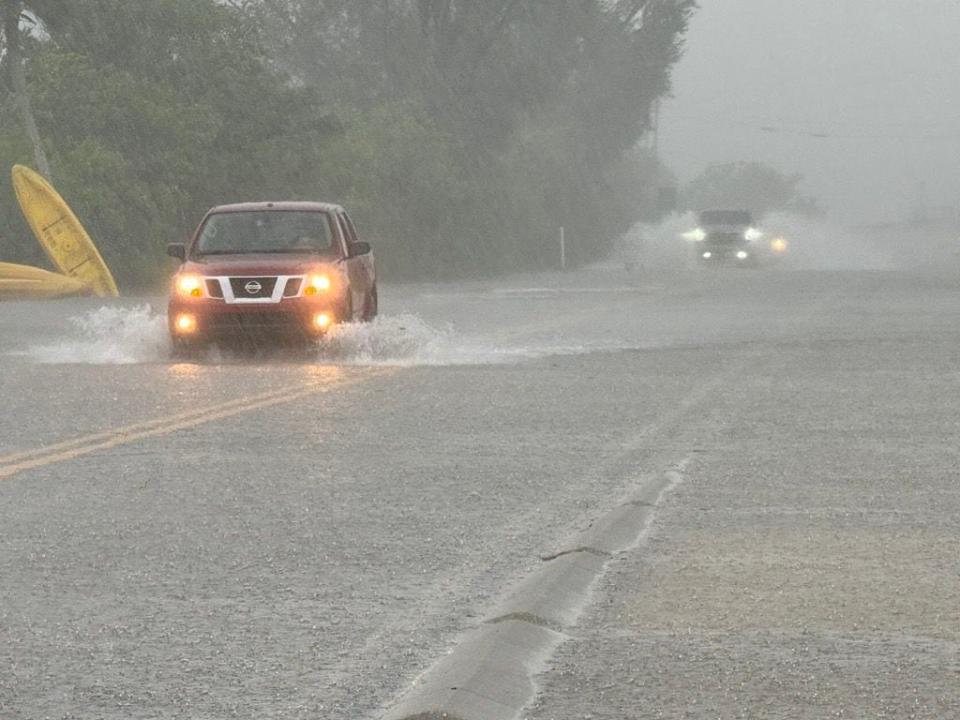 Manasota Key Road near Blind Pass Beach is underwater and closed.