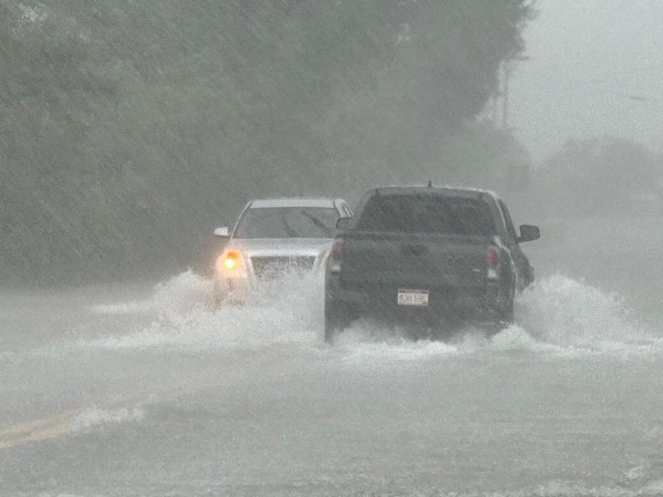 Manasota Key Road near Blind Pass Beach is underwater and closed.