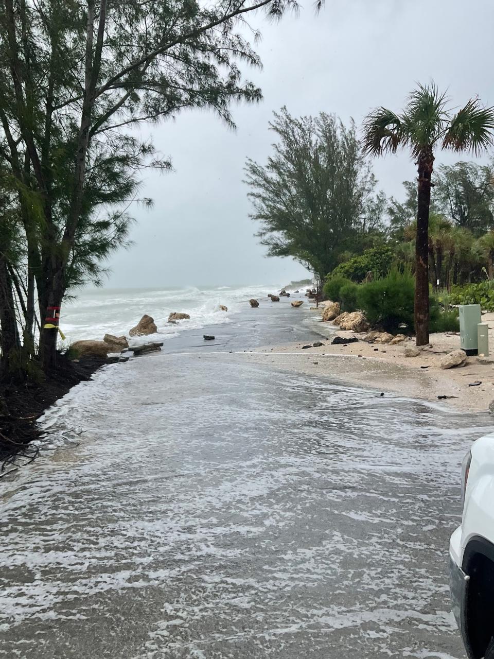 Sarasota County Government shuts down North Casey Key Road during Tropical Storm Debby.