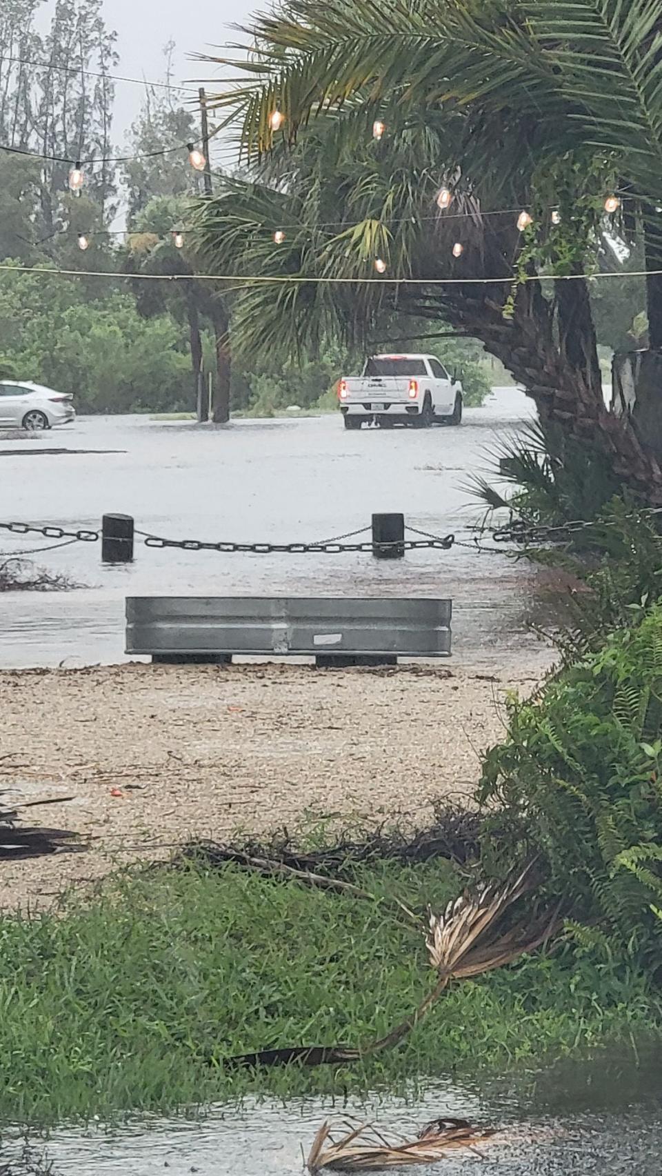 Roads are flooded in Charlotte County due to Tropical Storm Debby.