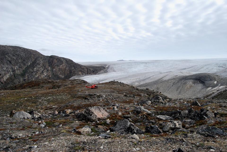 A rocky landscape with ice nearby.