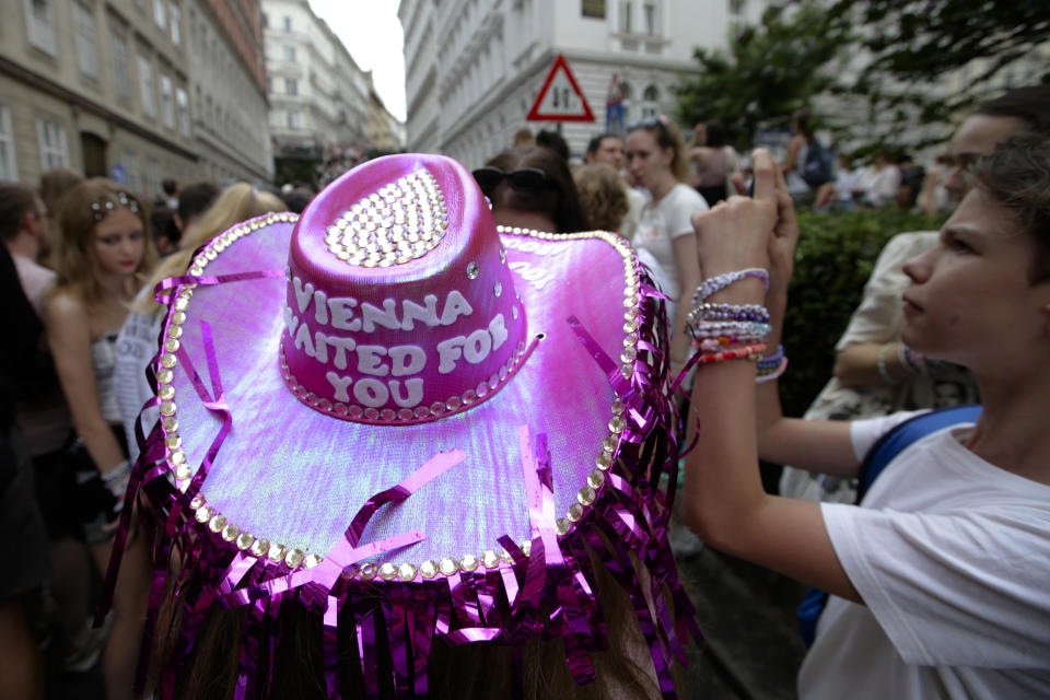 Someone wearing pink hat with words: Vienna waited for you.