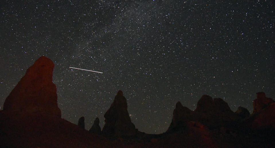 Meteor streaking over Trona Pinnacles near Death Valley during annual Perseid meteor showers, in 2019.