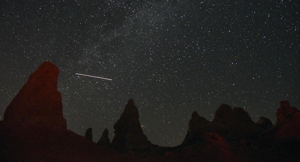 View of meteorite streaking  over Trona Pinnacles near Death Valley, CA during annual Perseid Meteor Showers, Aug. 2, 2019. / Credit: Bob Riha Jr / Getty Images