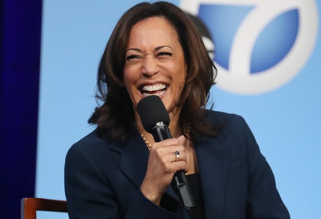 In 2019, then-Democratic presidential candidate Sen. Kamala Harris laughs at a Democratic presidential forum on Latino issues at Cal State LA.