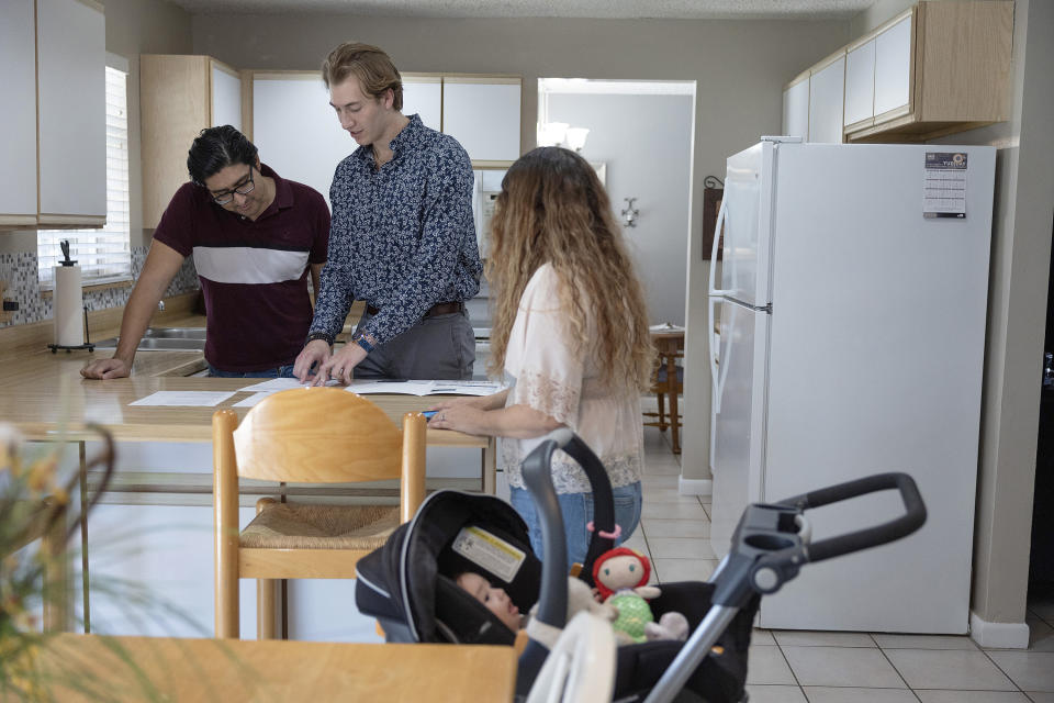 CUTLER BAY, FLORIDA - APRIL 20: Ryan Ratliff (C), Real Estate Sales Associate with Re/Max Advance Realty,  shows Ryan Paredes (L) and Ariadna Paredes a home for sale on April 20, 2023 in Cutler Bay, Florida. In a report by the National Association of Realtors, existing-home sales edged 2.4% lower in March to a seasonally adjusted annual rate of 4.44 million. In addition, sales declined 22.0% from one year ago.. (Photo by Joe Raedle/Getty Images)