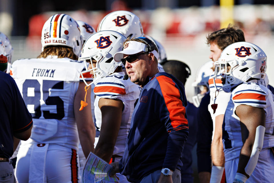 FAYETTEVILLE, ARKANSAS - NOVEMBER 11: Head Coach Hugh Freeze of the Auburn Tigers celebrates after his team scored a touchdown during the game against the Arkansas Razorbacks at Donald W. Reynolds Razorback Stadium on November 11, 2023 in Fayetteville, Arkansas. The Tigers defeated the Razorbacks 48-10.  (Photo by Wesley Hitt/Getty Images)