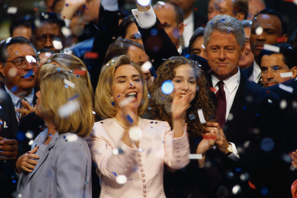 Supporters of Bill Clinton, waving, including his wife, Hillary, daughter Chelsea and Tipper Gore, cheer and applaud at the 1996 Democratic National Convention, following Clinton's acceptance speech. 