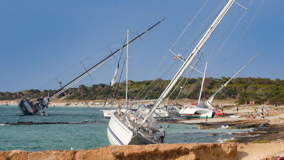 Ships stranded in Formentera, Spain following a storm last week. - GIM/GTRES/Shutterstock