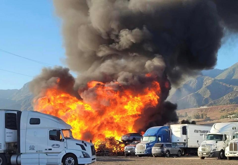 A pallet yard fire damaged several vehicles in the 2700 block of Yucca Avenue in San Bernardino on Wednesday, Aug. 21, 2024.