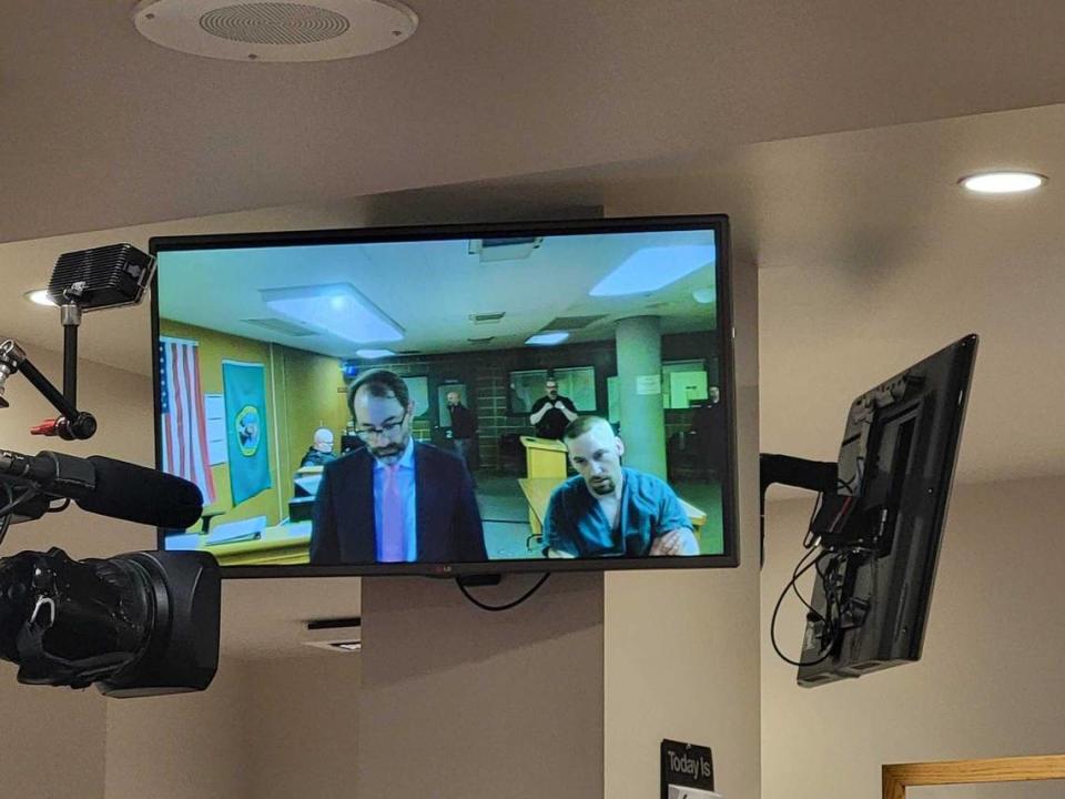 Michael Doane, right, makes a first appearance by video Thursday, April 13, 2023, in Whatcom County Superior Court in Bellingham, Wash. With him is attorney Richard Larson, a public defender with the Whatcom County Public Defender’s Office. Doane, Melissa Welch and Cody Craig, were booked into the Whatcom County Jail earlier Thursday on suspicion of first-degree murder in connection with the death of his 5-year-old daughter. The child died March 8, 2023, due to a “very high and fatal amount” of fentanyl in her bloodstream, according to police in Ferndale, Wash.