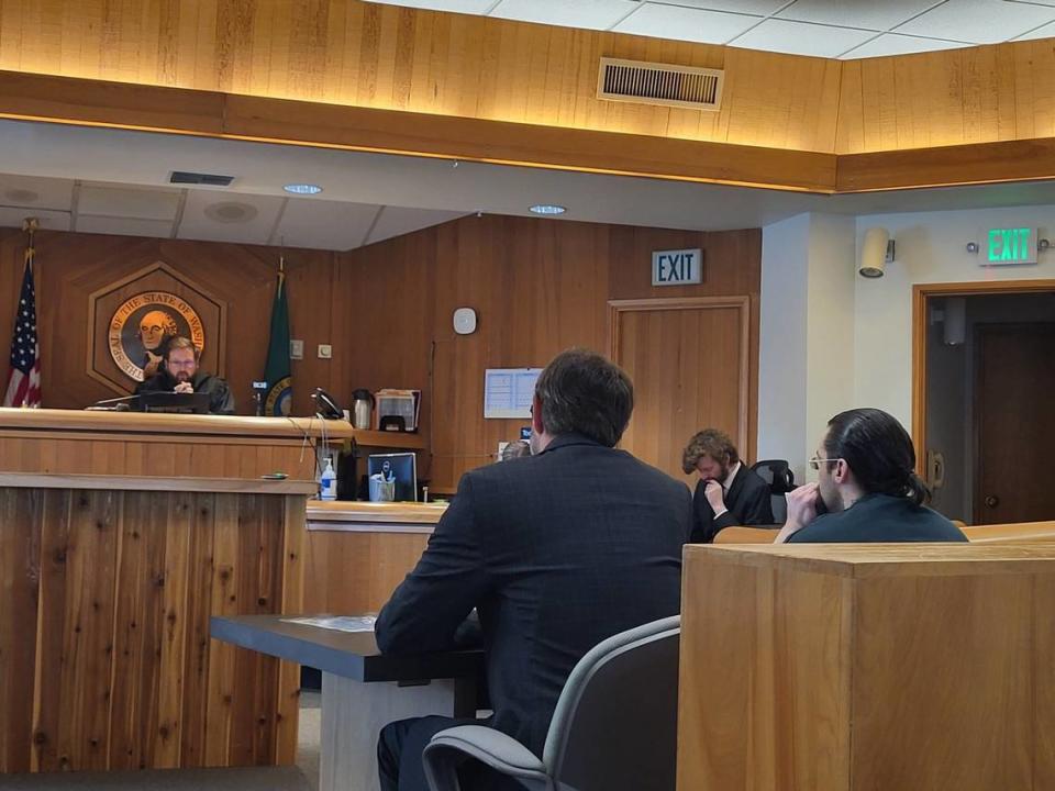 Michael Wayne Doane, 34, of Ferndale, (right) sits silently during his sentencing hearing in Whatcom County Superior Court on July 29, 2024. Doane was sentenced to four years in prison for the March 2023 manslaughter overdose death of his 5-year-old daughter.