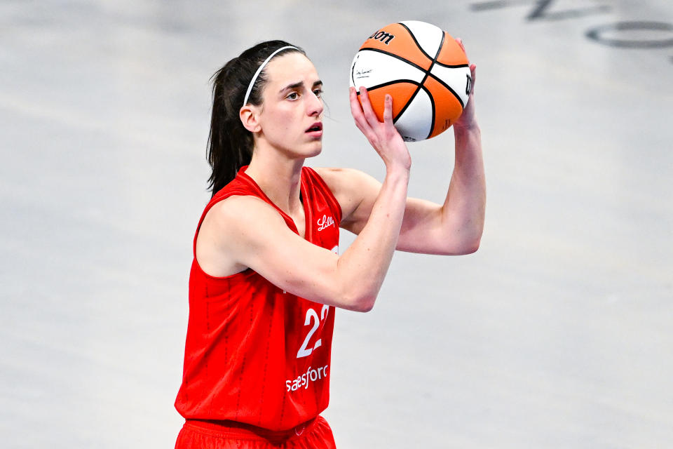 ATLANTA, GA  AUGUST 26:  Indiana guard Caitlin Clark (22) shoots a free throw during the WNBA game between the Indiana Fever and the Atlanta Dream on August 26th, 2024 at State Farm Arena in Atlanta, GA. (Photo by Rich von Biberstein/Icon Sportswire via Getty Images)