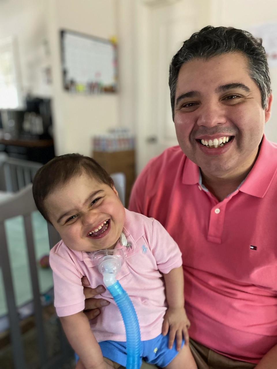 PHOTO: Nathaniel is all smiles with his father, Jorge Flores. (Courtesy of Sandya Flores)