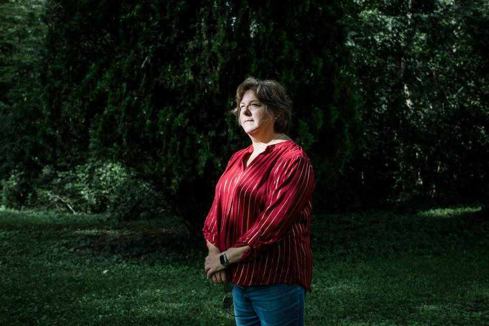 Ann Faucette surrounded by trees (Rosem Morton for NBC News)