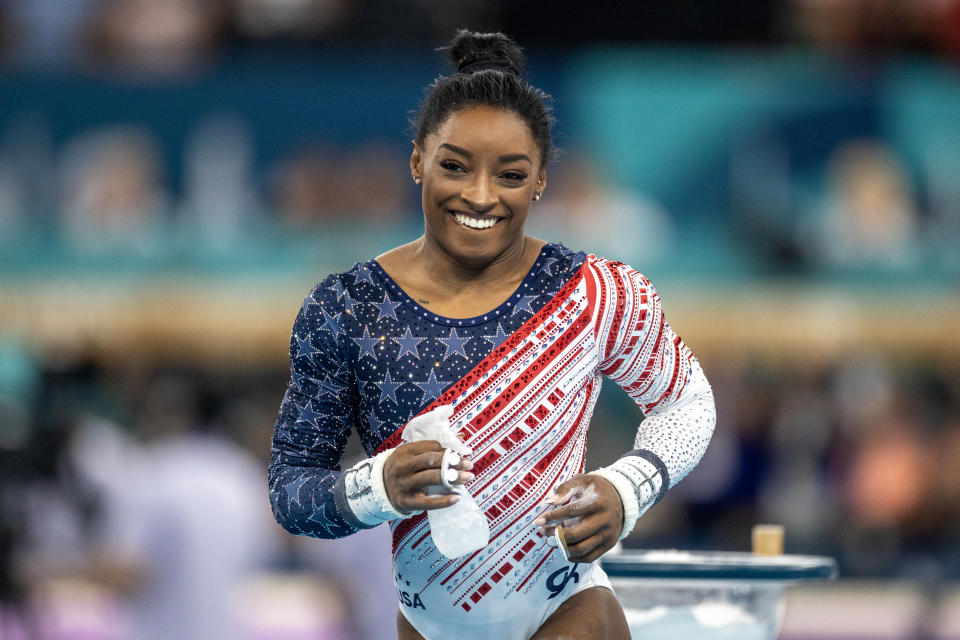 PARIS, FRANCE: JULY 30: Simone Biles of the United States reacts after performing her uneven bars routine during the Artistic Gymnastics Team Final for Women at the Bercy Arena during the Paris 2024 Summer Olympic Games on July 30th, 2024 in Paris, France. (Photo by Tim Clayton/Corbis via Getty Images)